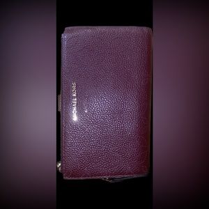 NWOT burgundy, double zip Michael Kors wallet